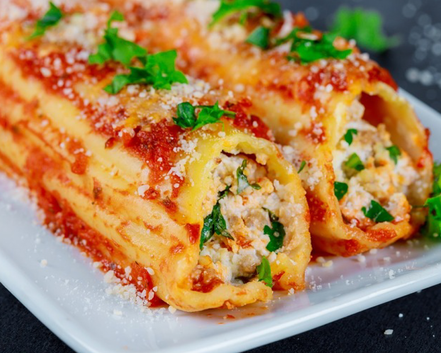 Cheese and Spinach Manicotti With Meat Sauce